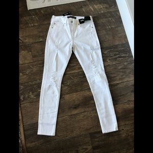 White distressed skinny jeans